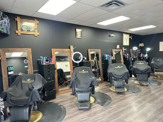Salon station with logo backdrop